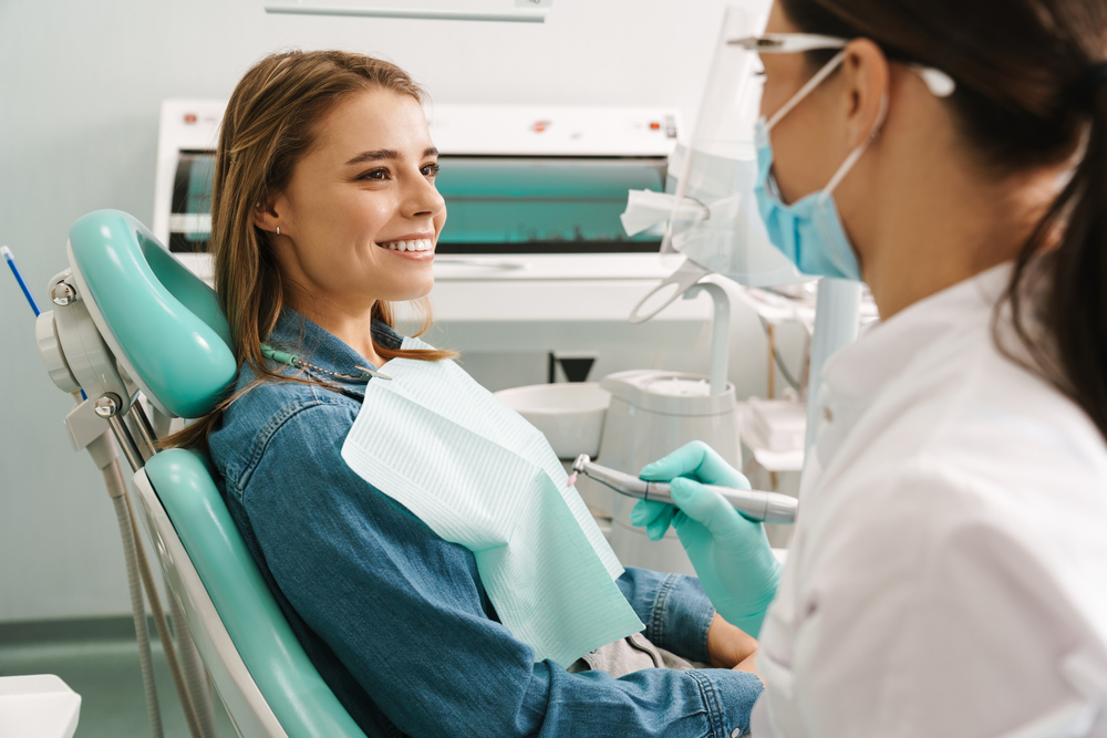 Dr. Ghorbani and team caring for a patient at Shield Dental Care